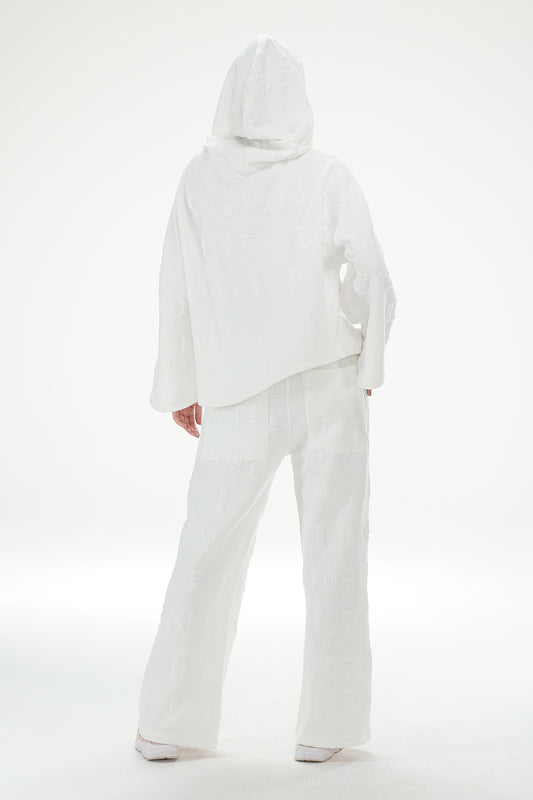White hoodie and pants set on a white background